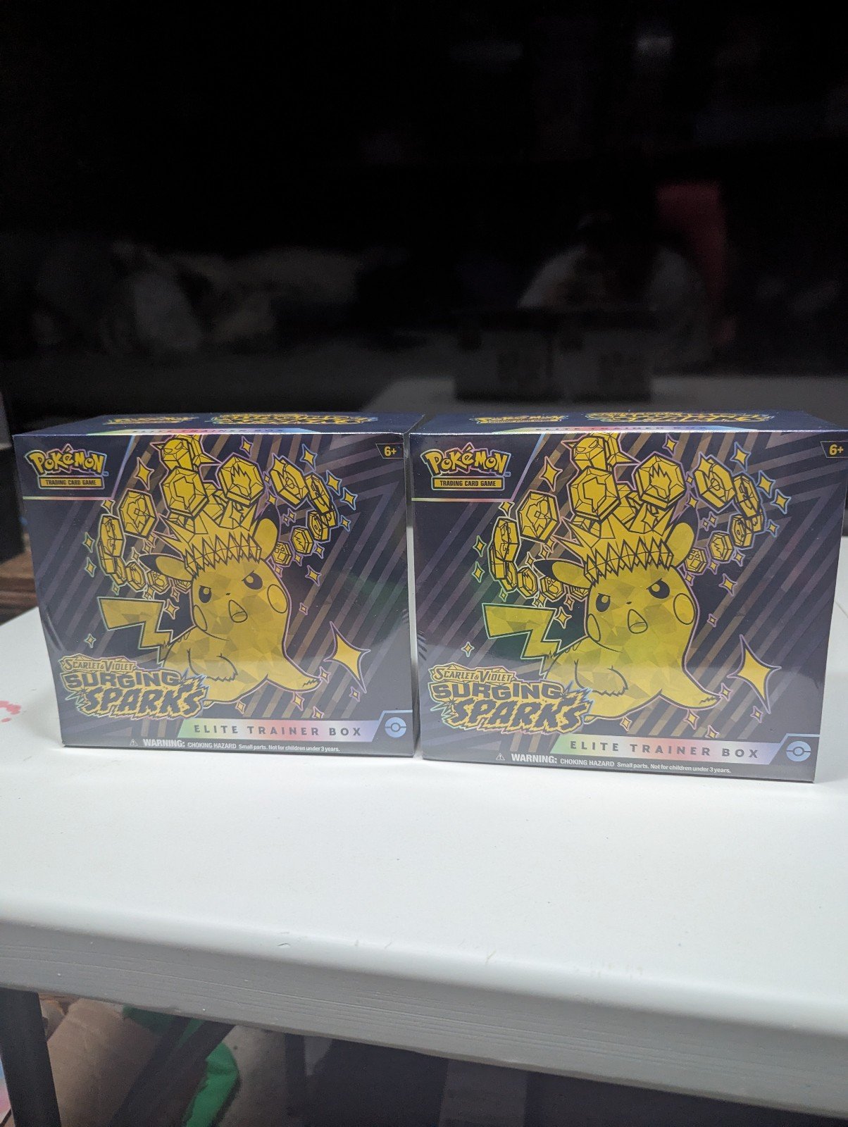 Lot of two Pokemon TCG Surging Sparks Elite Trainer Box - SV08 Factory Sealed